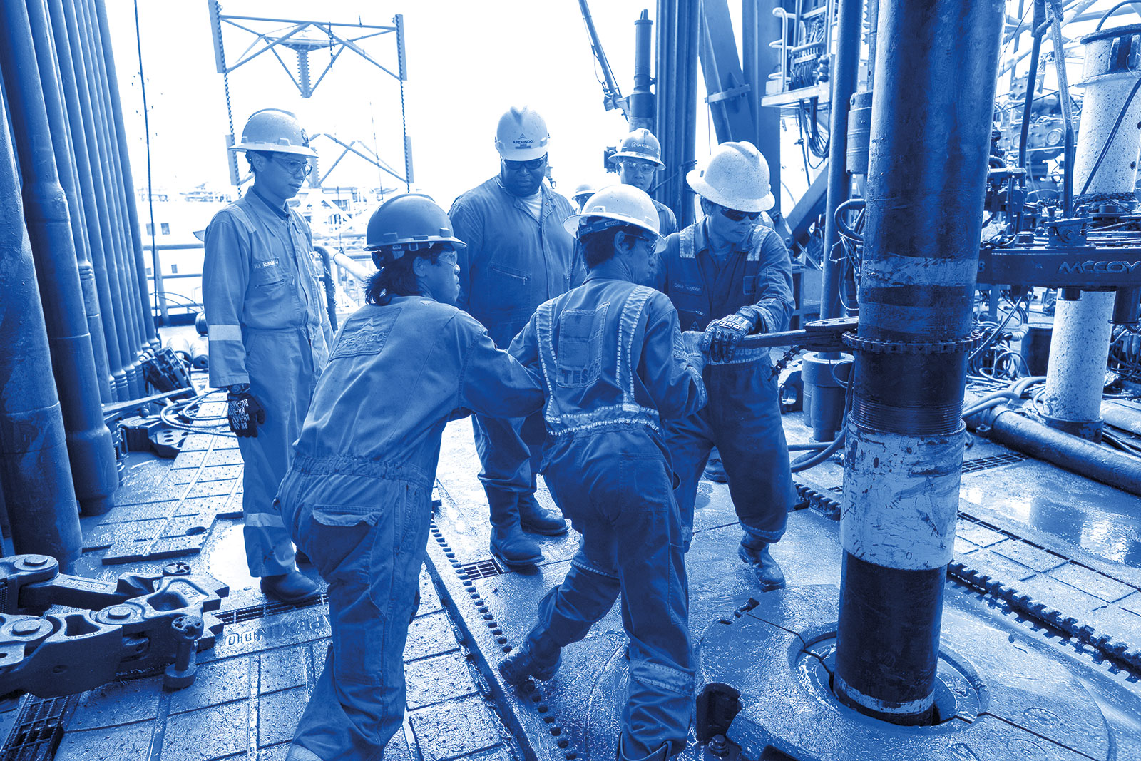 Drilling crew on a rig in Mahakam, Indonesia.